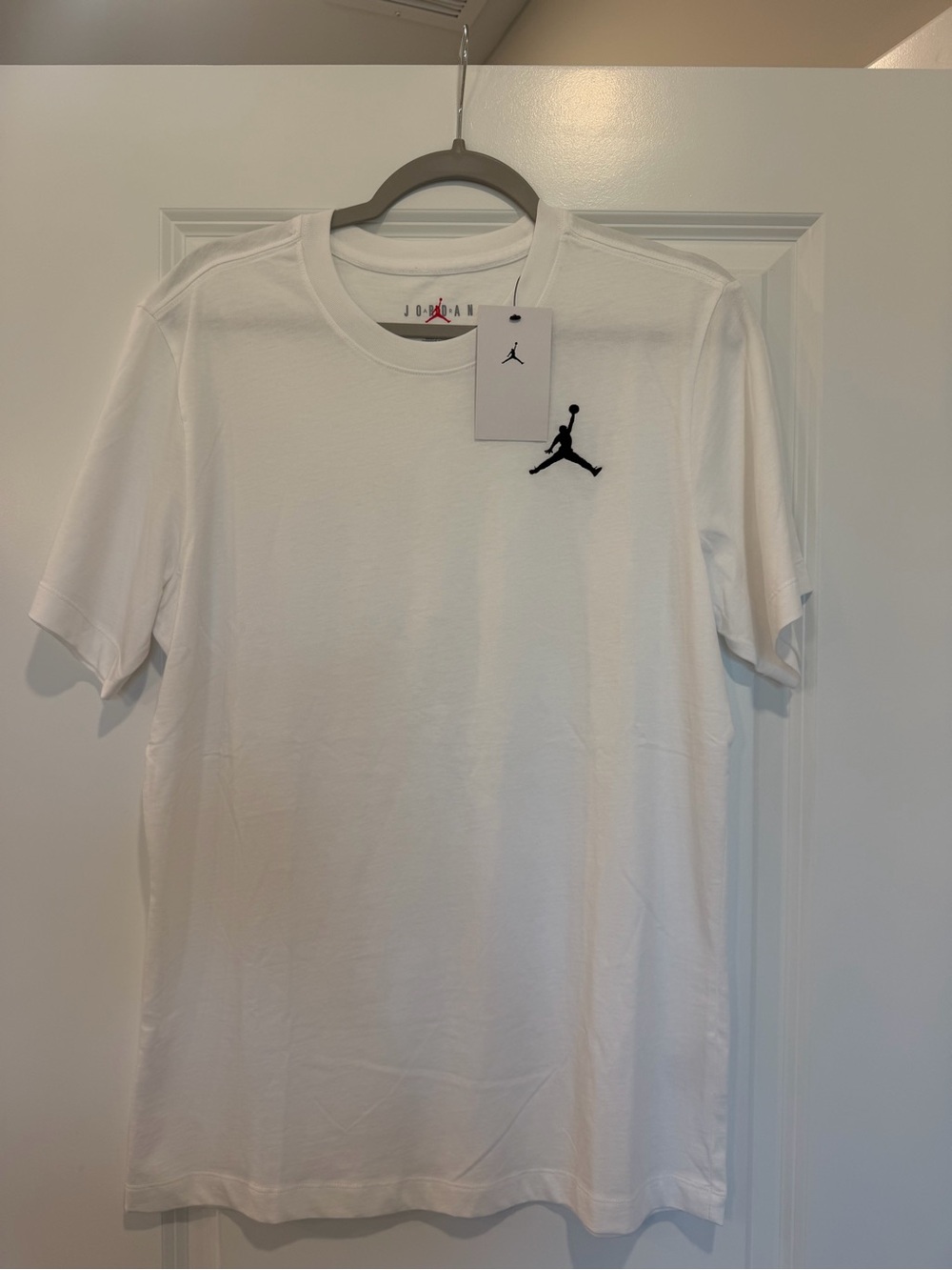 Jordan White Short Sleeve Tee with Black Jumpman - M